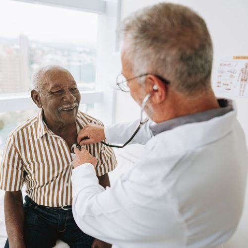 Doctor performing surgery with a team